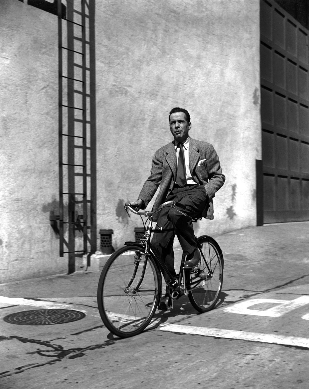 Humphrey Bogart on bicycle