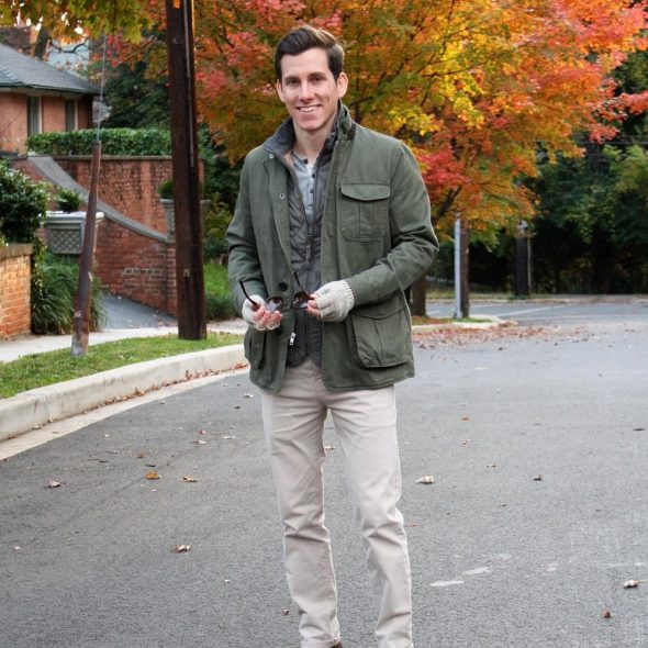 Grey vest under olive field jacket