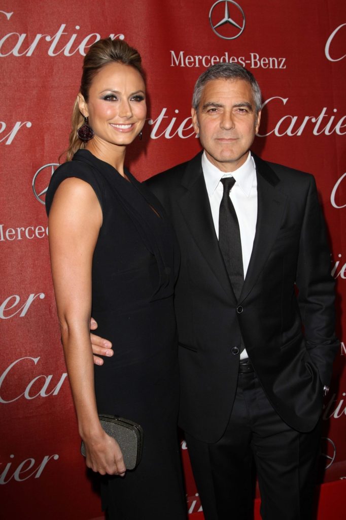 Stacy Keibler (5'11") w/ George Clooney (5'10")