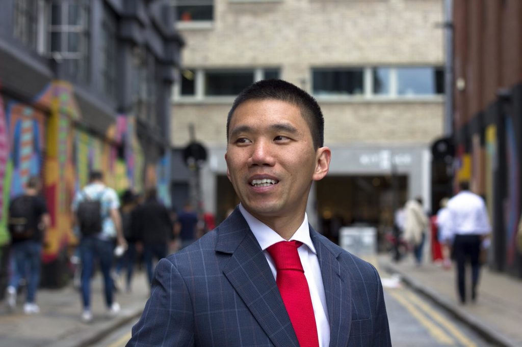 Blue suit with red tie