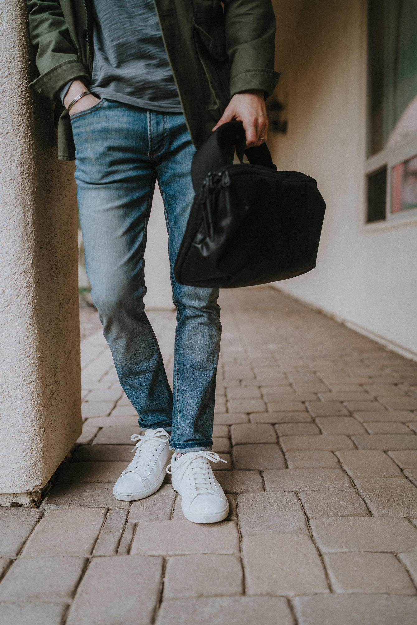 White sneakers light wash jeans