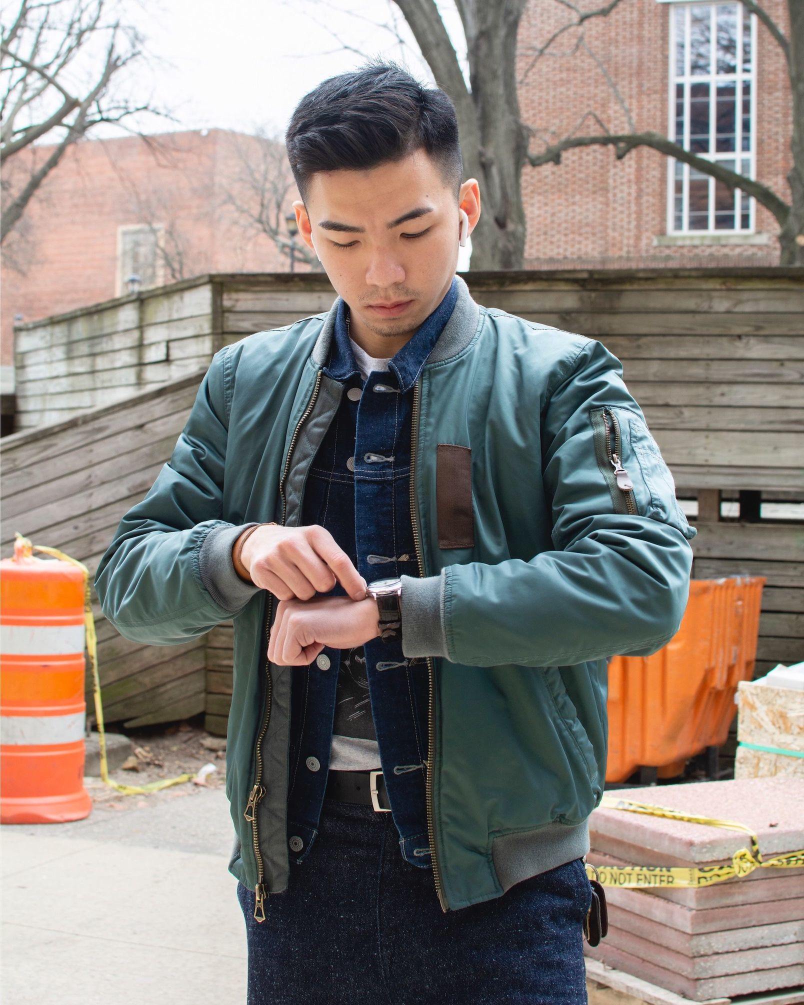 Humphrey Tsui checking his watch