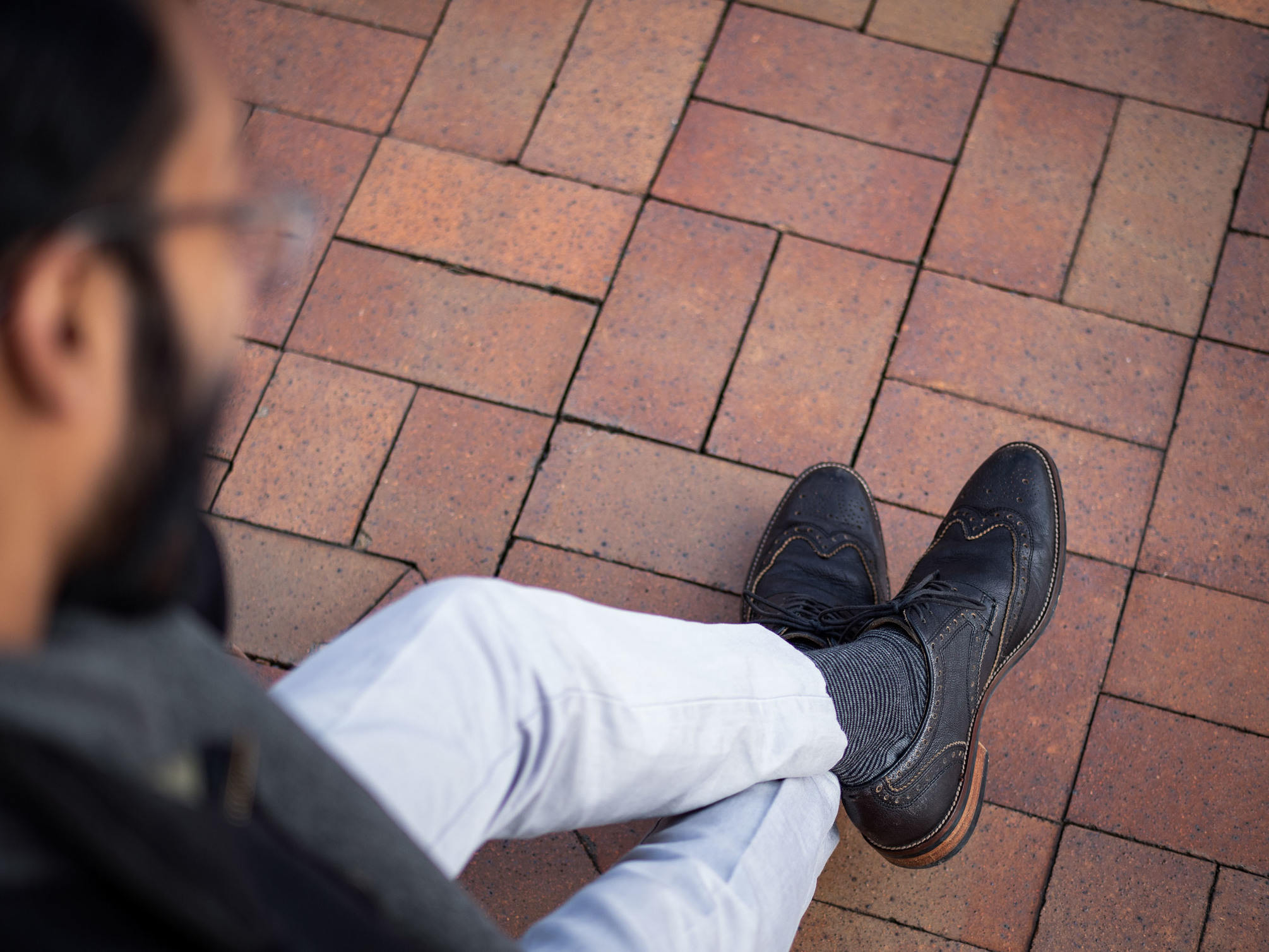 Rajesh's black brogues