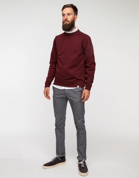 man wearing gray chinos and maroon shir