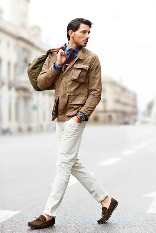 man wearing white chinos and loafers