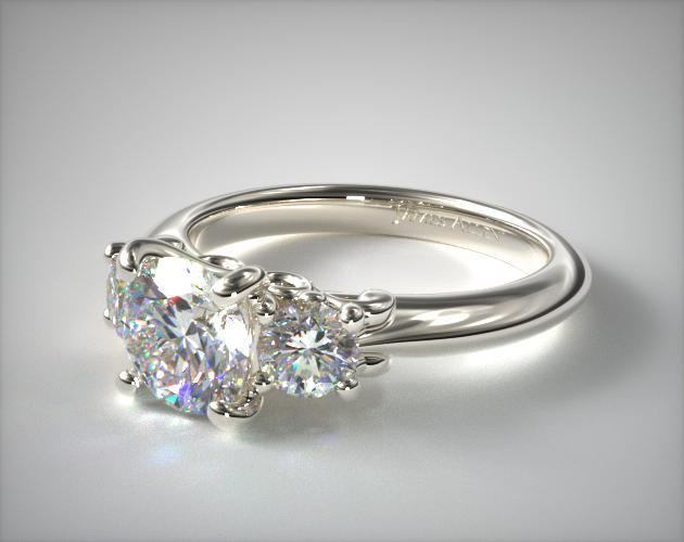 Three stone engagement ring