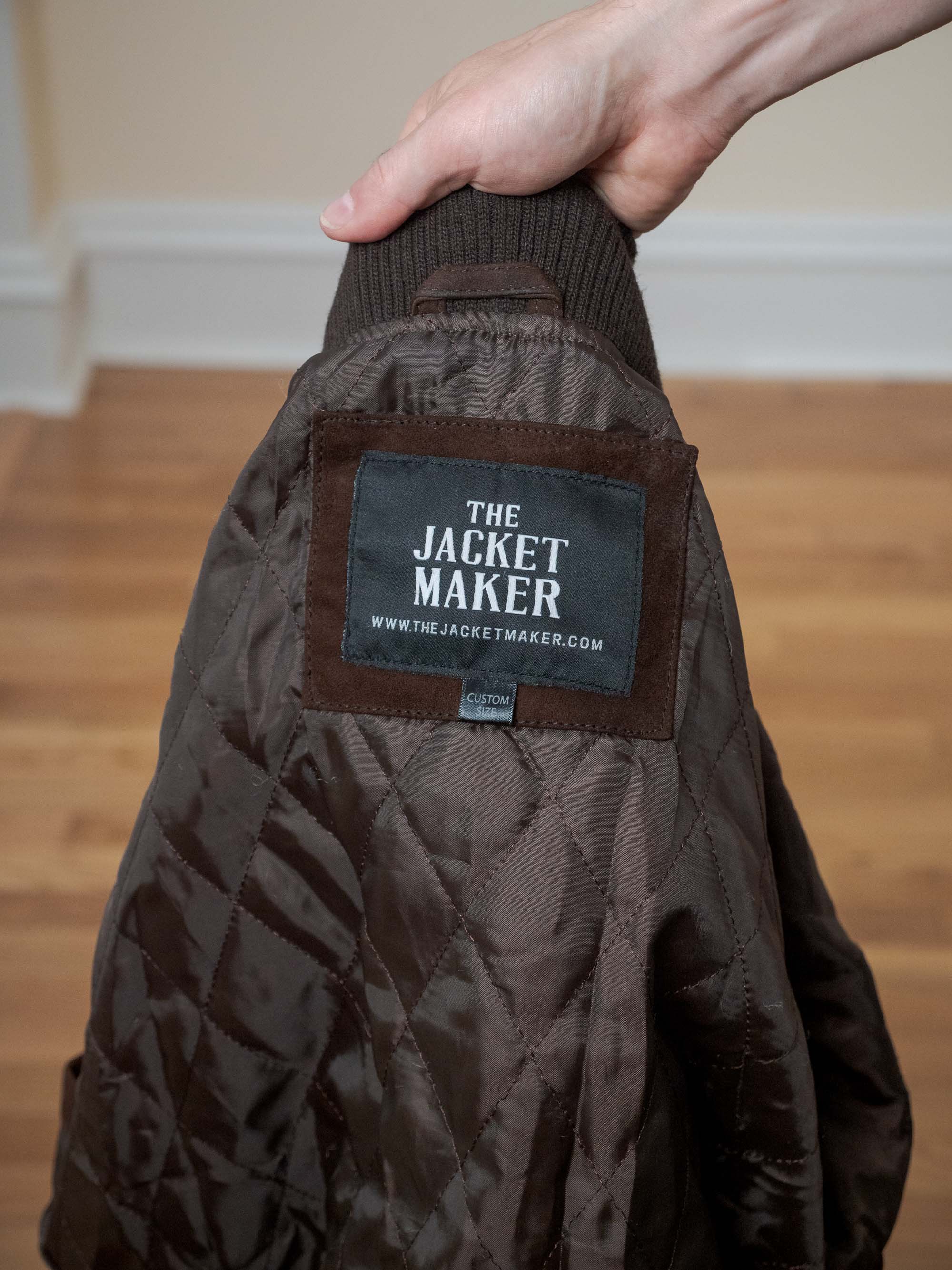 The Jacket Maker logo