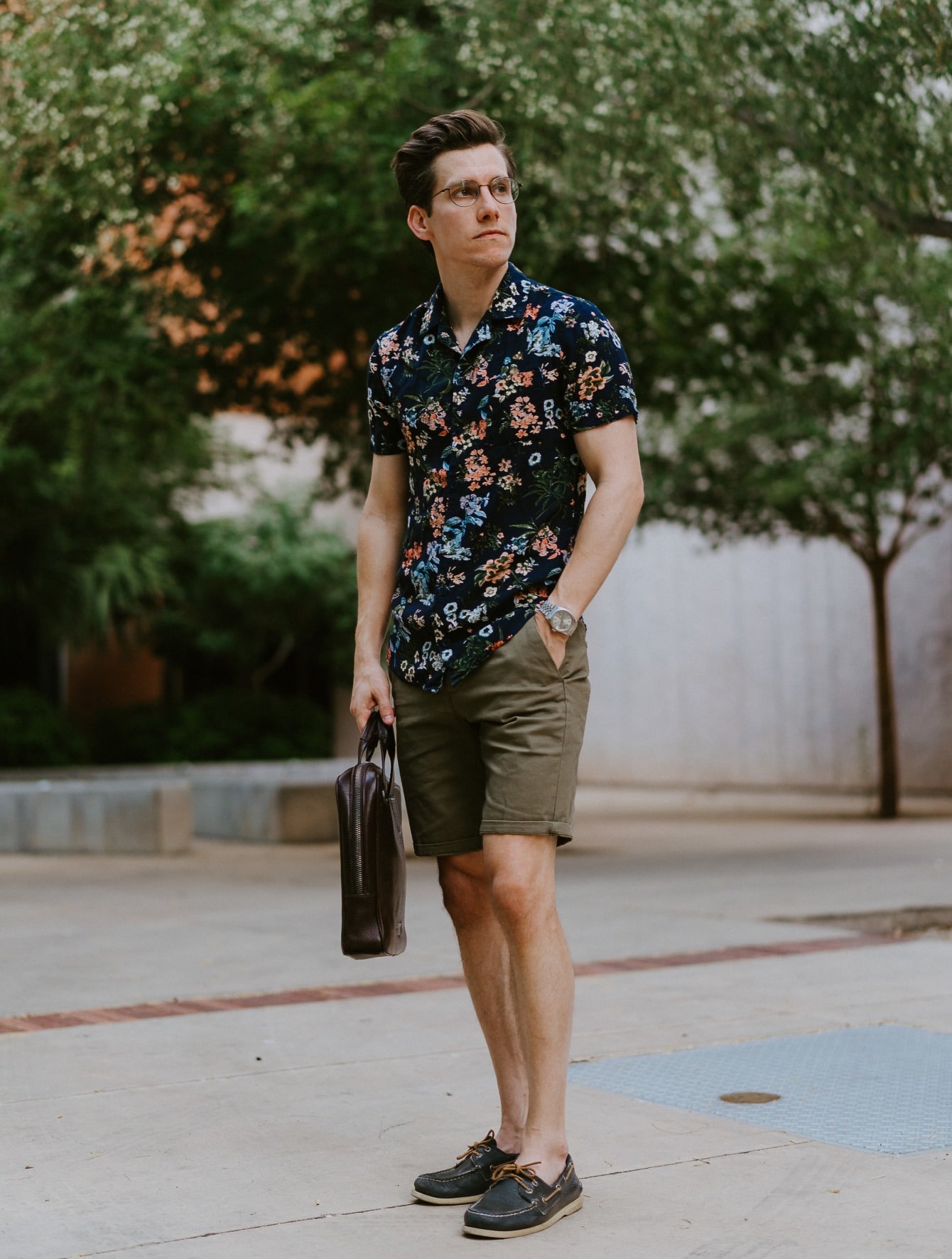 Brock wearing floral print and shorts