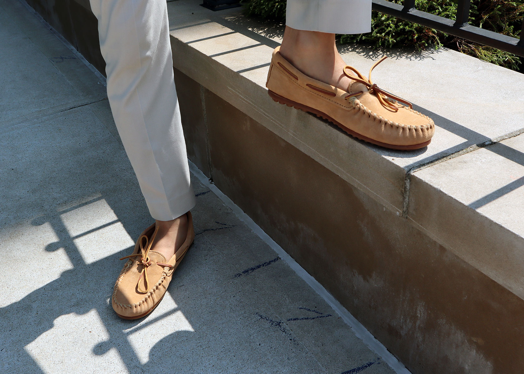 Minnetonka classic moc with white pants