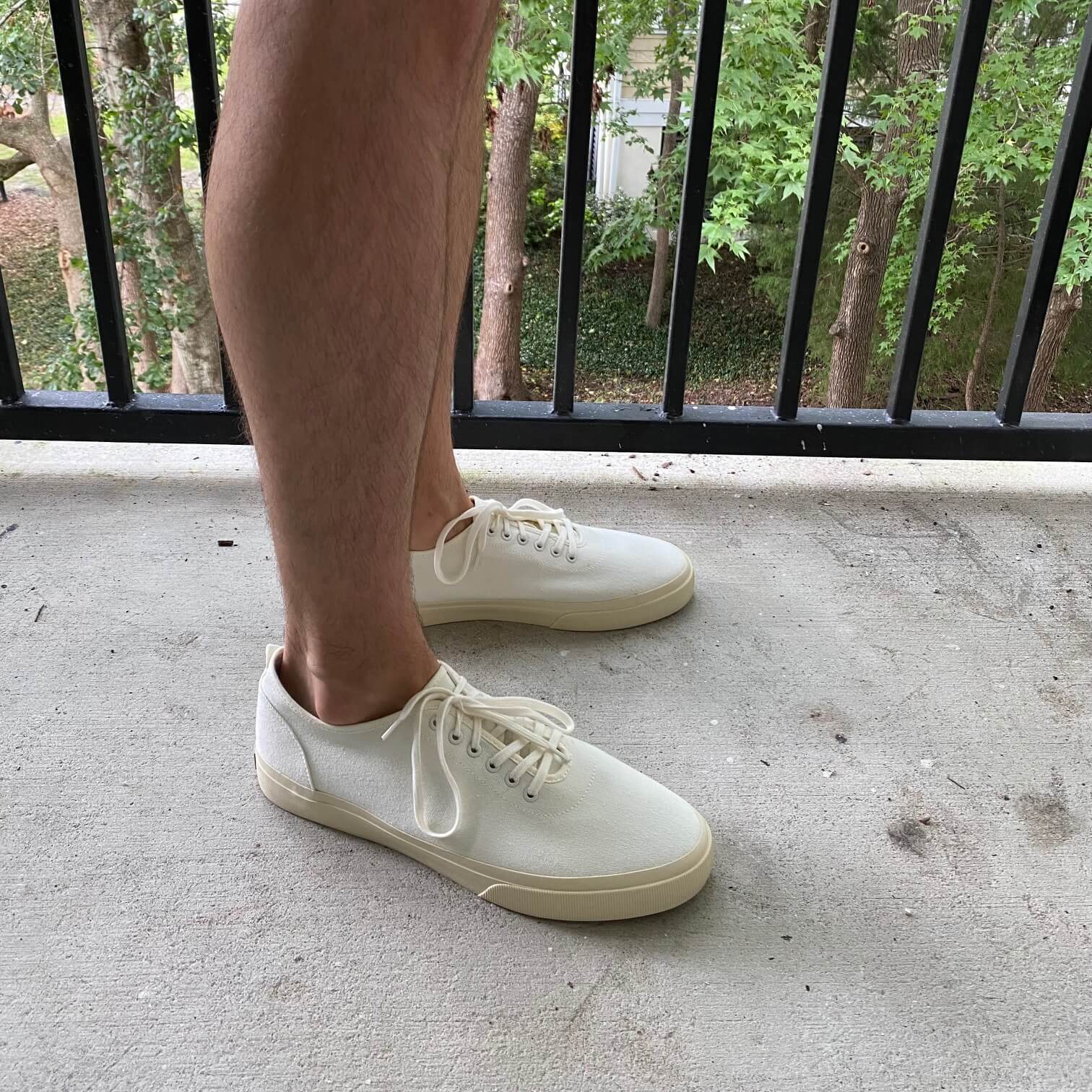 Graham wearing the Everlane Forever Sneaker side view