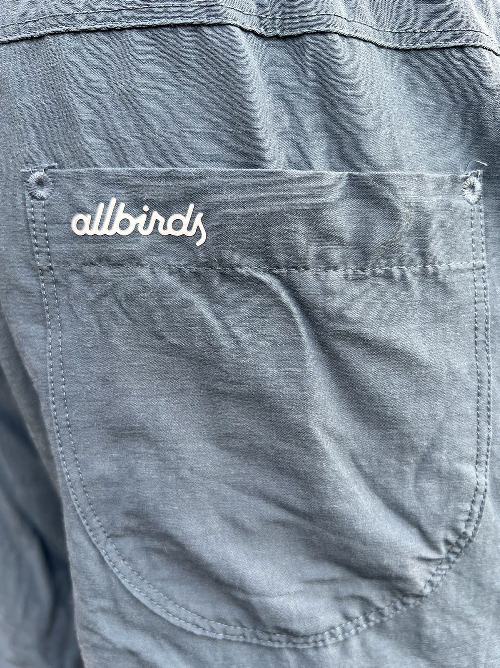 Allbirds natural run short logo