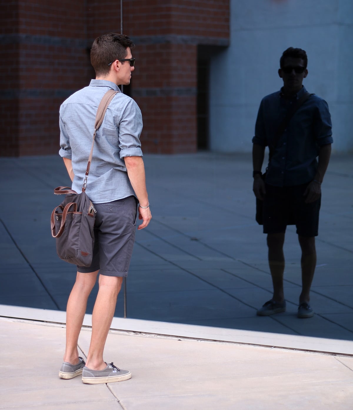 Brock looking at reflection