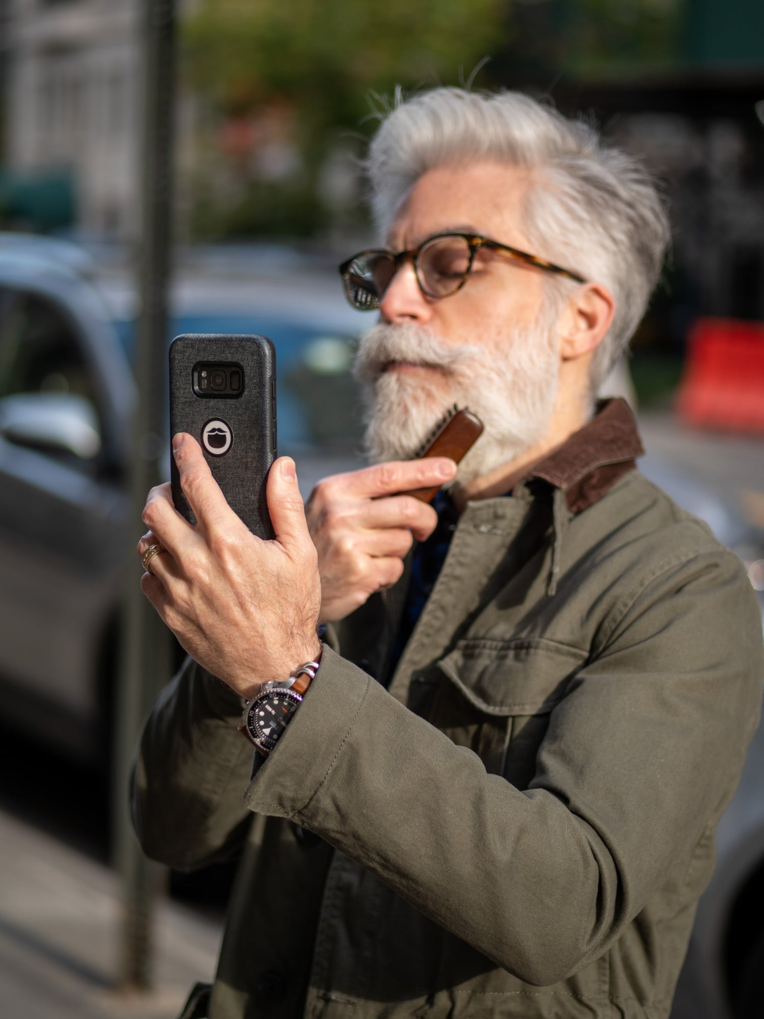 Eric combing his beard