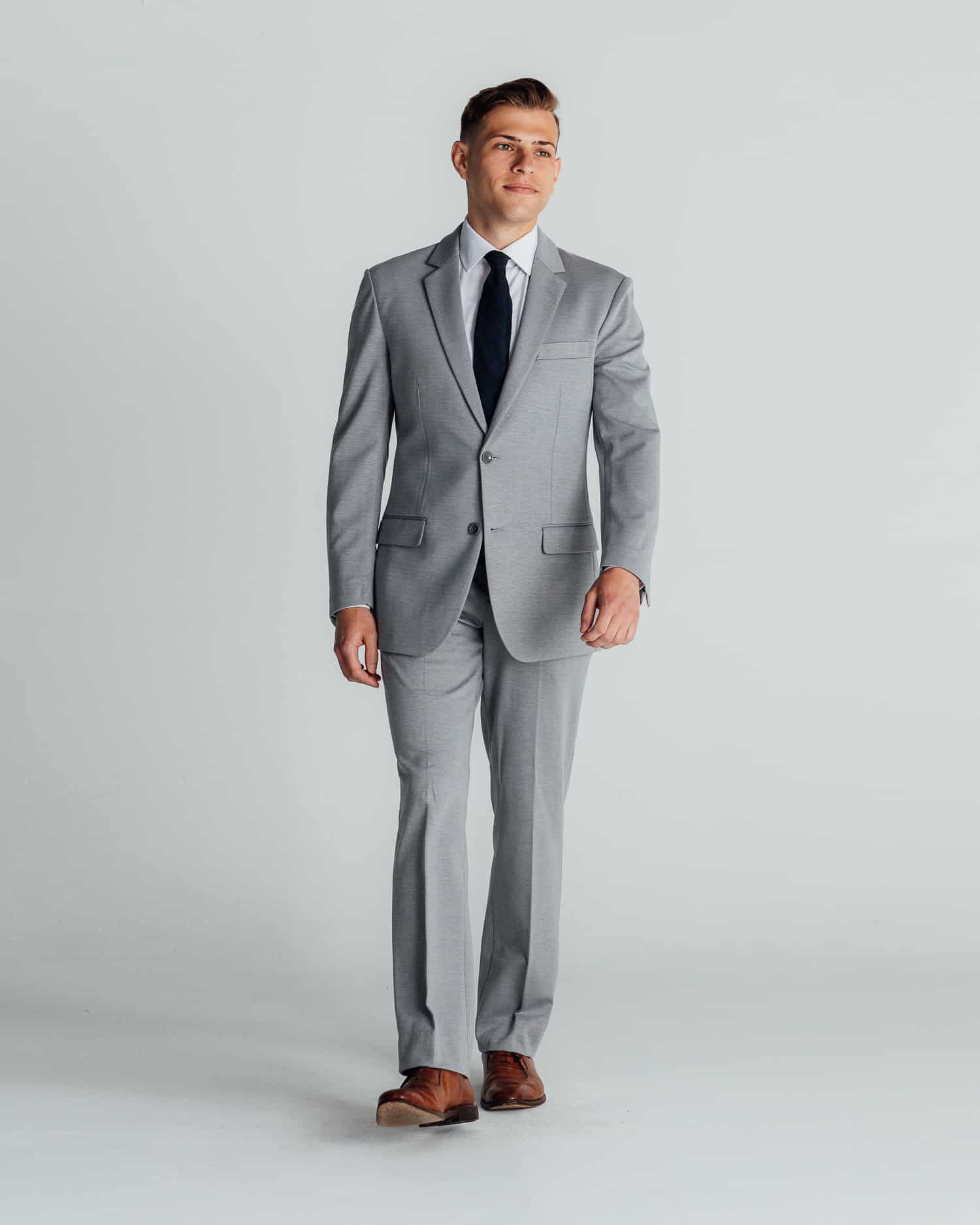 Ryan wearing light grey suit