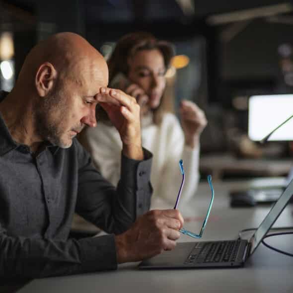 Man Exhausted While Working