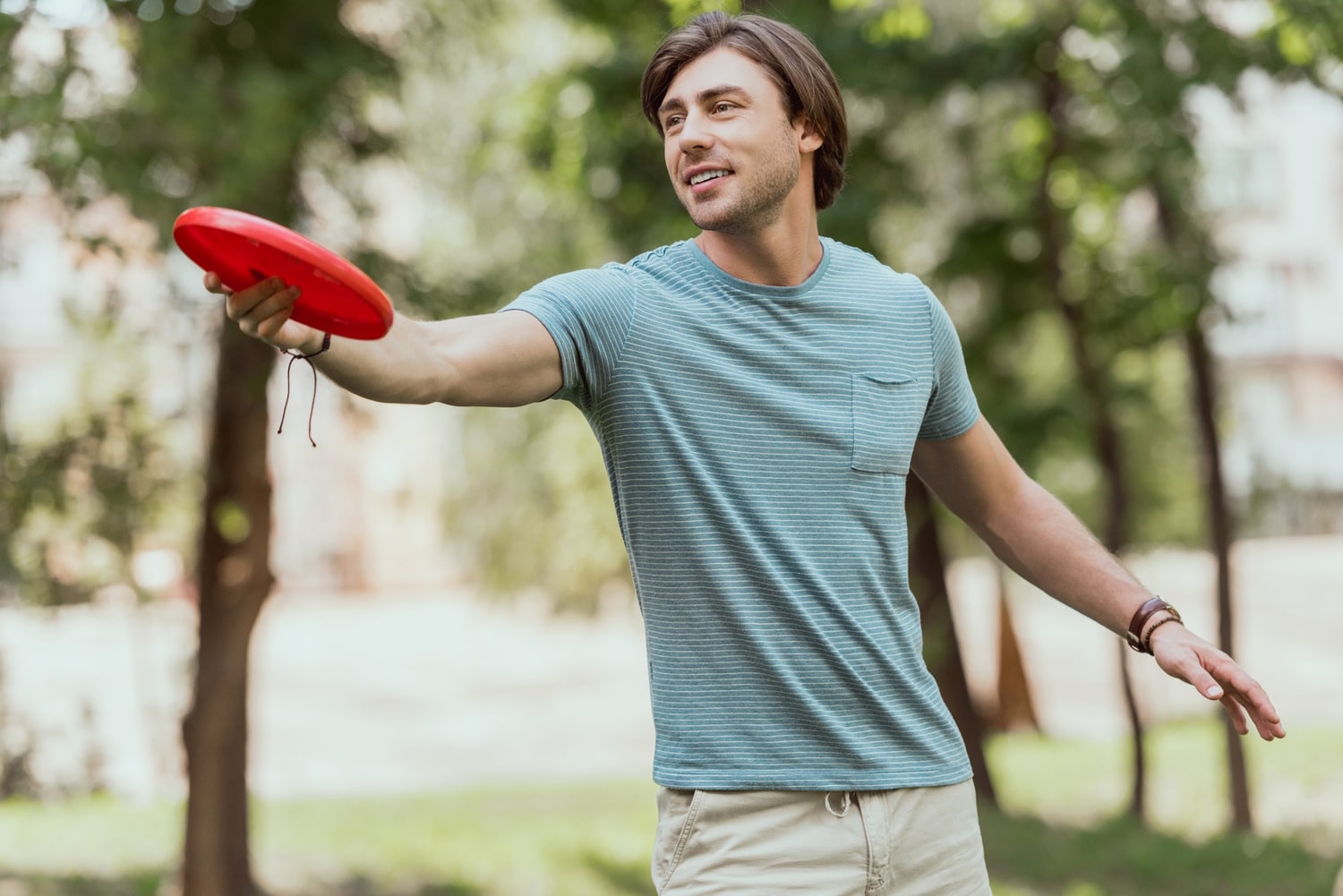 Man Throwing Frisbee