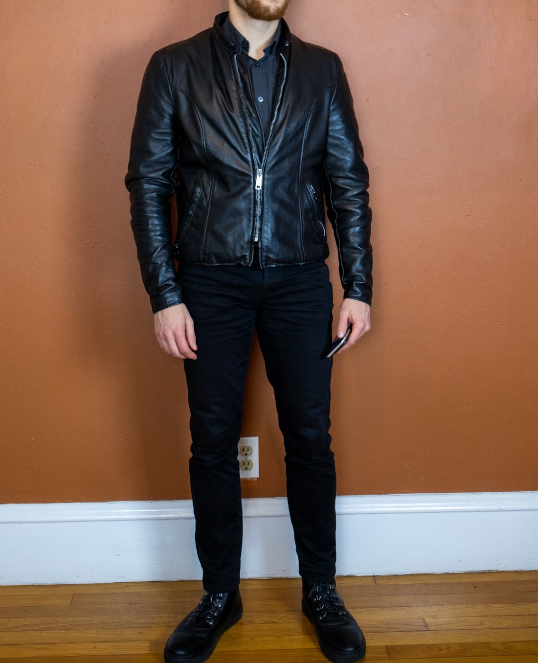 Leather jacket over henley shirt